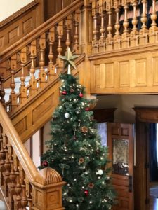 Staircase Wrapped Around Christmas Tree at Castle La Crosse