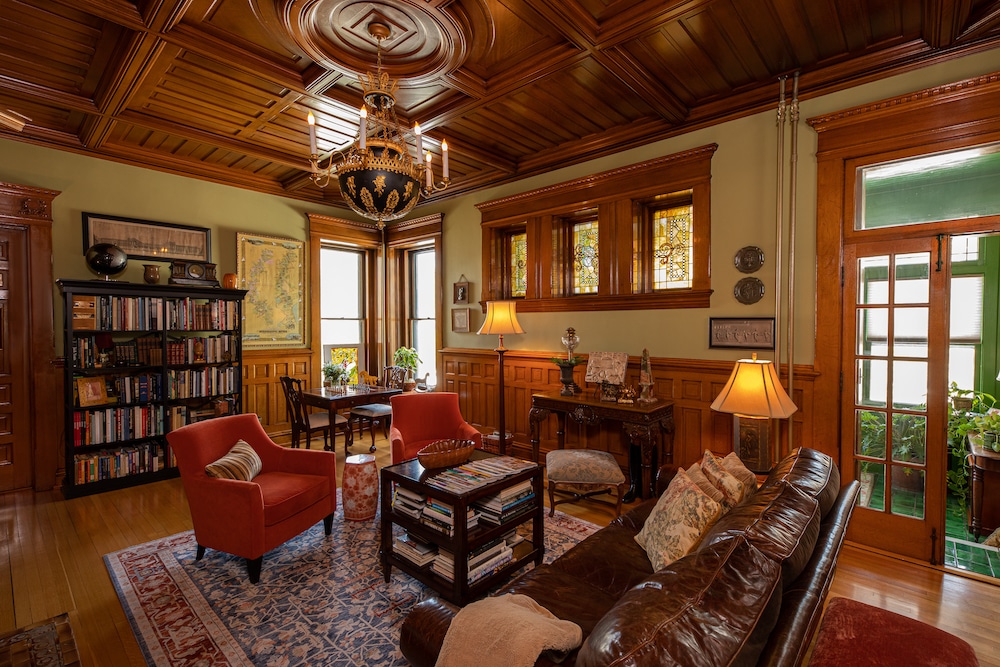 Get cozy in our library at the Castle - the perfect winter getaway in WIsconsin as you visit the National Eagle Center on the Mississippi
