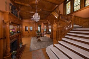 Grand entrance and staircase that welcomes you when you take the opportunity to book your stay in a Castle in La Crosse, Wisconsin